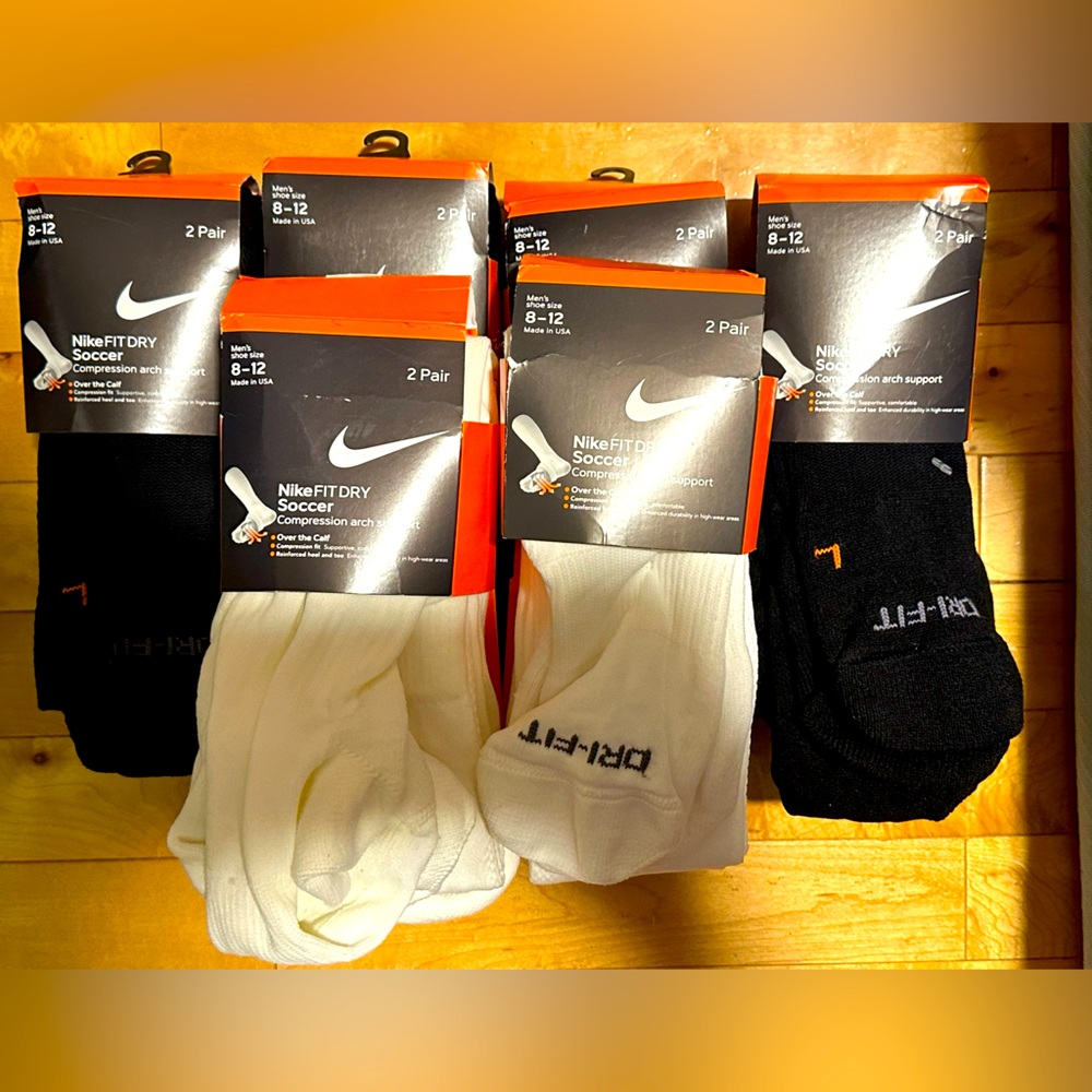 A bundle of Nike soccer socks size L